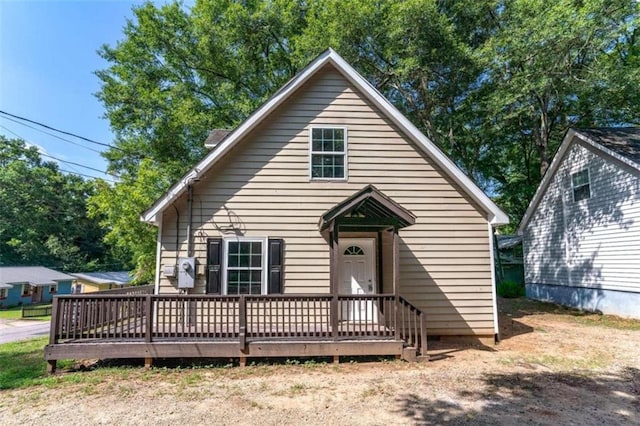 bungalow featuring a deck