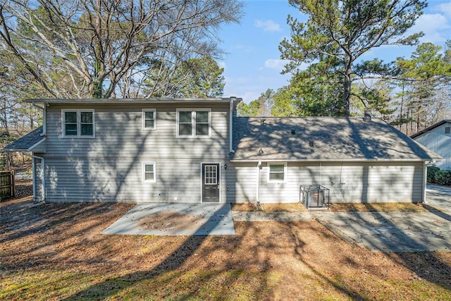 back of property with a patio area