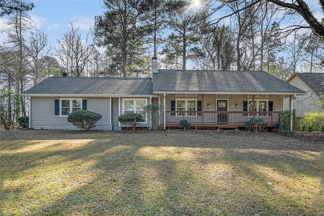 single story home with a front lawn