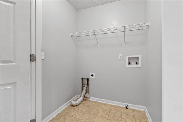 clothes washing area featuring electric dryer hookup and washer hookup