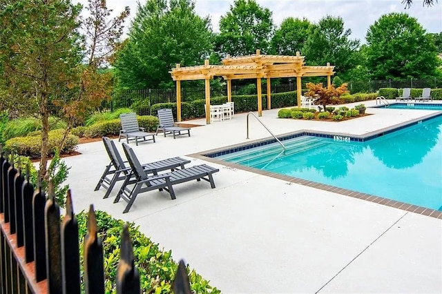 view of pool featuring a pergola and a patio