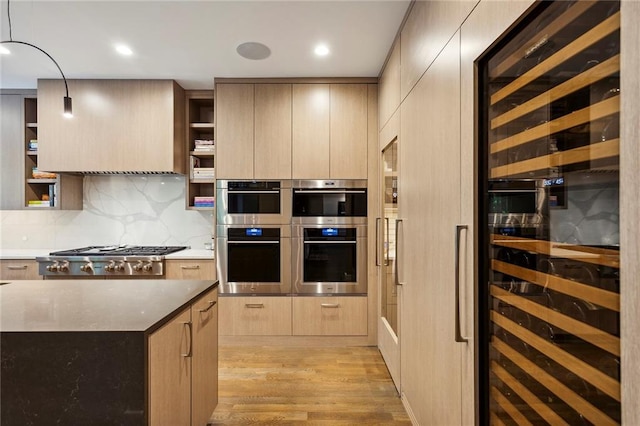 kitchen featuring wine cooler, stainless steel appliances, light wood-style floors, open shelves, and modern cabinets