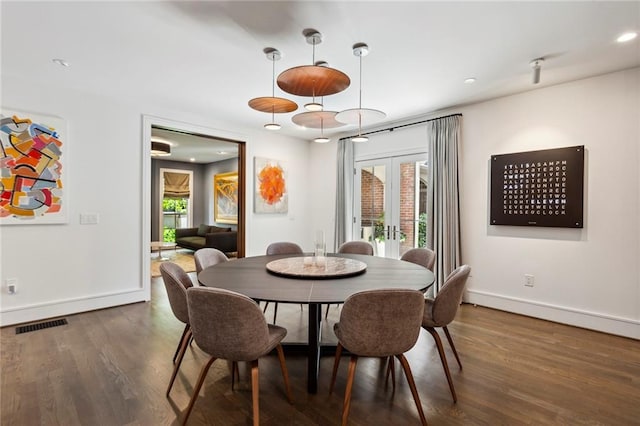 dining room featuring visible vents, baseboards, wood finished floors, french doors, and recessed lighting