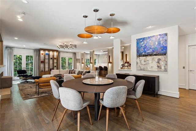 dining area with french doors, recessed lighting, wood finished floors, and baseboards