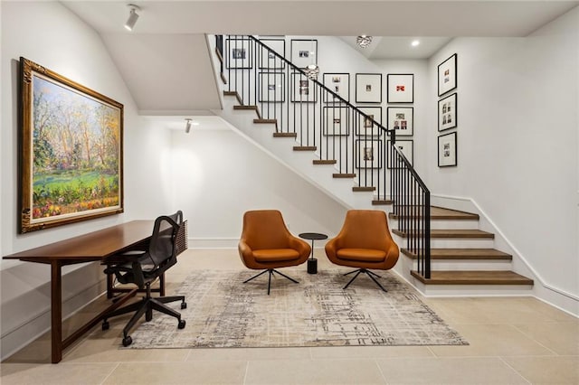 tiled office space with recessed lighting and baseboards