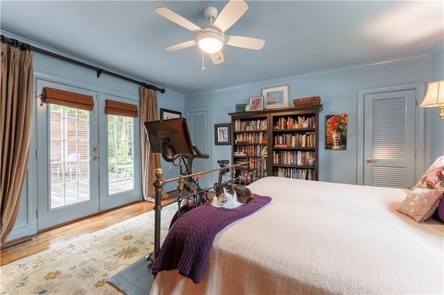 657 E Paces Ferry Rd NE, Atlanta, GA 30305 - bedroom featuring access to outside, wood finished floors, french doors, crown molding, and ceiling fan