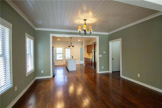 2125 Chalybe Dr, Hoover, AL 35226 - unfurnished living room featuring visible vents, ornamental molding, baseboards, a chandelier, and dark wood-style flooring
