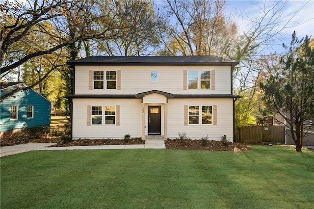 front facade featuring a front lawn