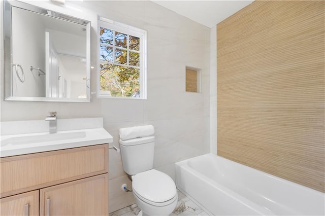 full bathroom featuring shower / bathtub combination, vanity, tile walls, and toilet