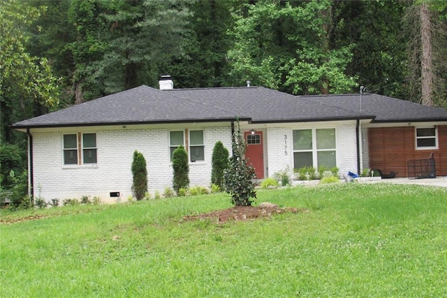 3175 W Manor Cir SW, Atlanta, GA 30311 - ranch-style house with a chimney, brick siding, a front lawn, and a shingled roof