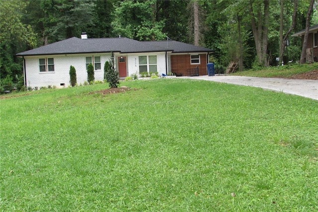 3175 W Manor Cir SW, Atlanta, GA 30311 - ranch-style home with driveway, a front yard, a chimney, and brick siding