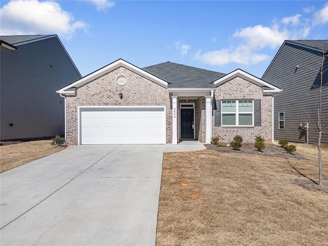 ranch-style home featuring a garage, concrete driveway, brick siding, and a shingled roof