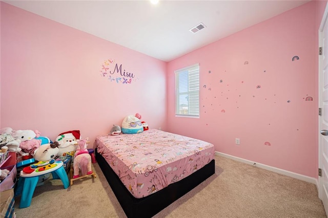 bedroom with carpet flooring, visible vents, and baseboards