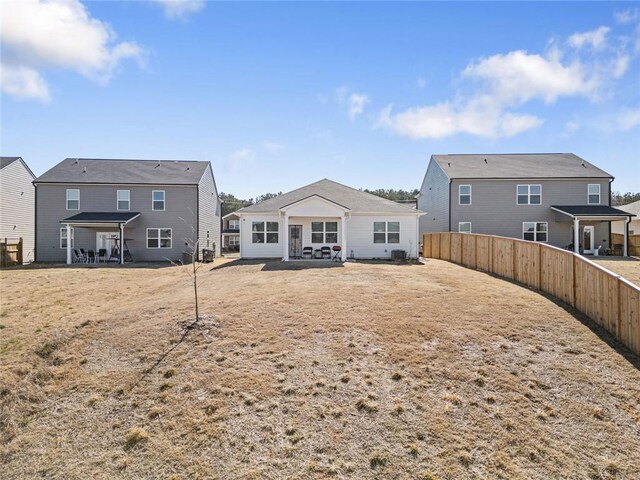 2030 Vidalia Ct, Dacula, GA 30019 - back of house featuring a patio area and fence