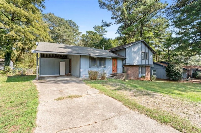 view of front facade with a front yard and a carport