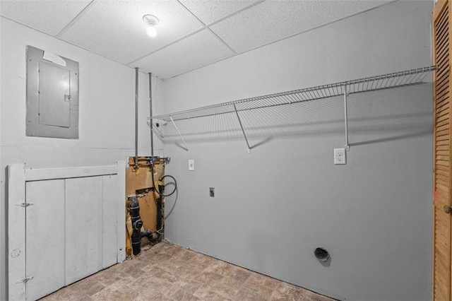 laundry area with electric panel