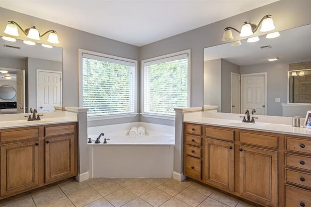 4765 Silver Leaf Dr, Cumming, GA 30040 - bathroom with a bath, two vanities, tile patterned flooring, and a tile shower