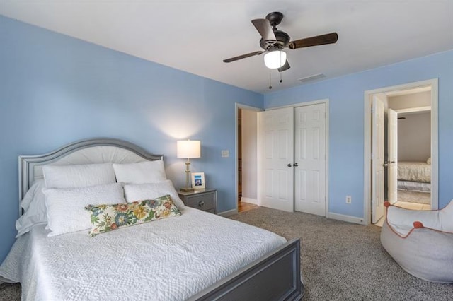 4765 Silver Leaf Dr, Cumming, GA 30040 - bedroom with carpet, a closet, and ceiling fan