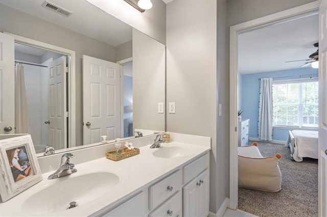 4765 Silver Leaf Dr, Cumming, GA 30040 - bathroom featuring ensuite bathroom, double vanity, ceiling fan, and curtained shower