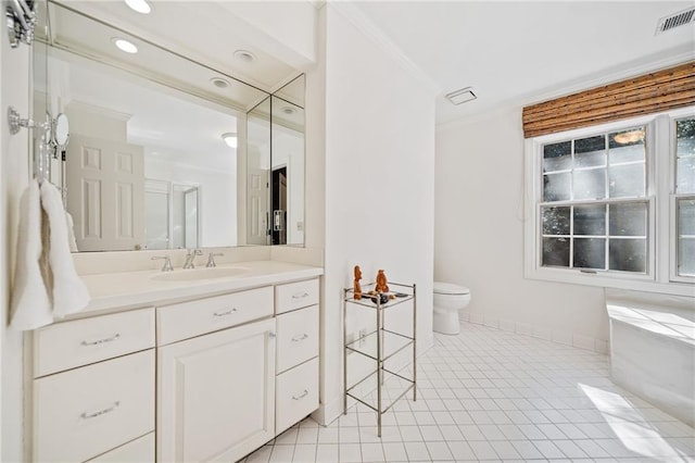 bathroom with tile patterned floors, vanity, toilet, ornamental molding, and visible vents