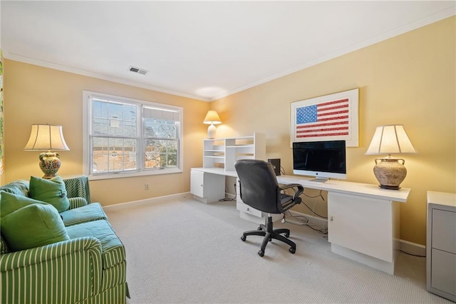 carpeted office with visible vents, crown molding, and baseboards