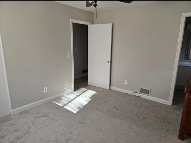 unfurnished bedroom with carpet flooring and ceiling fan