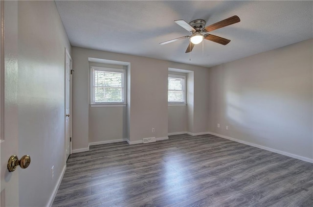 331 Leafmore Rd SW, Rome, GA 30165 - empty room with a ceiling fan, wood finished floors, and baseboards