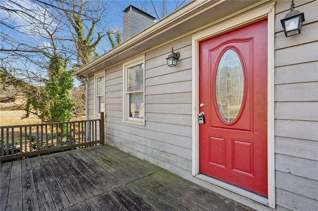 doorway to property with a deck