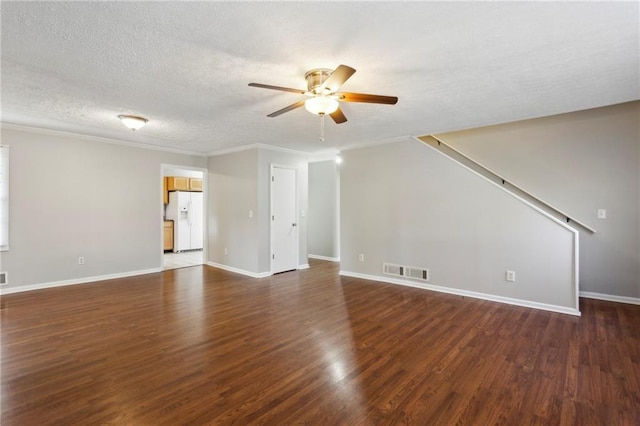 unfurnished living room featuring a textured ceiling, ornamental molding, dark hardwood / wood-style floors, and ceiling fan