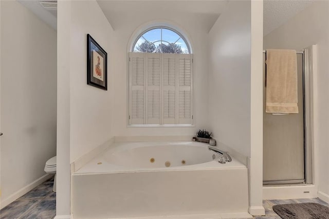 bathroom featuring separate shower and tub, a textured ceiling, and toilet