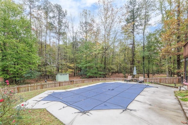 view of swimming pool featuring a patio