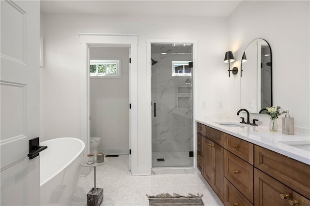 full bathroom featuring vanity, independent shower and bath, toilet, and tile patterned floors