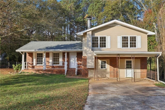 view of front of house with covered porch and a front lawn