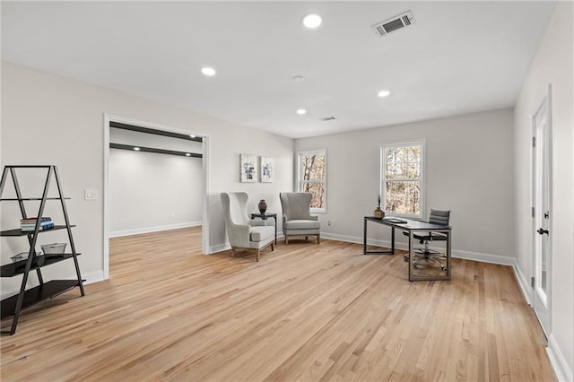 sitting room with recessed lighting, visible vents, baseboards, and light wood finished floors