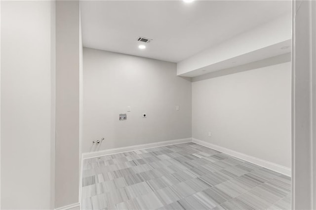 interior space featuring recessed lighting, baseboards, and visible vents