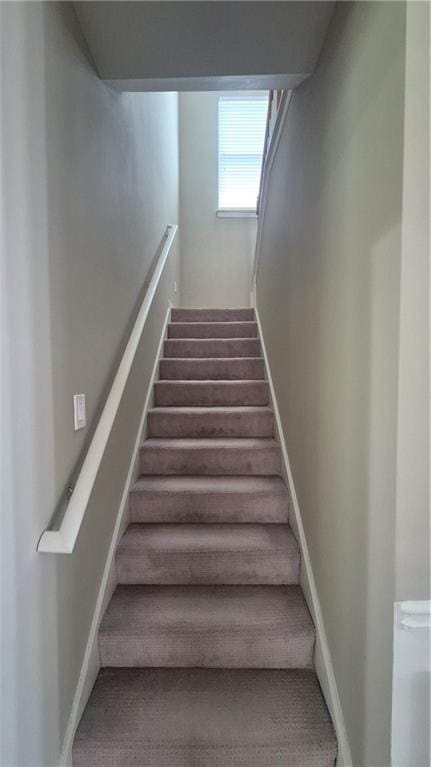 1015 Pebble Creek Trl, Suwanee, GA 30024 - stairs featuring baseboards and carpet flooring
