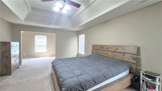 1015 Pebble Creek Trl, Suwanee, GA 30024 - bedroom featuring a raised ceiling, visible vents, carpet flooring, and ceiling fan