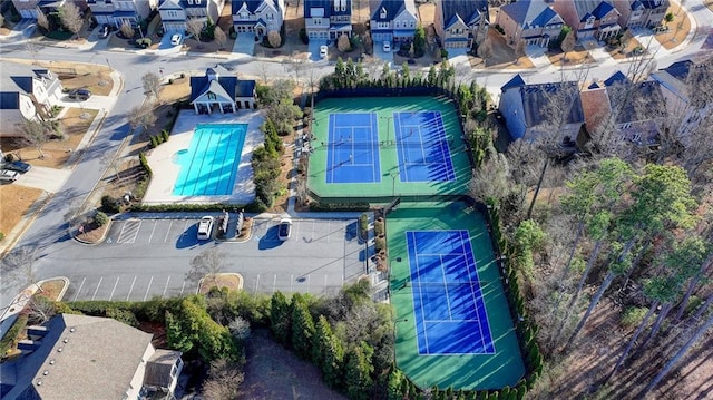 birds eye view of property with a residential view