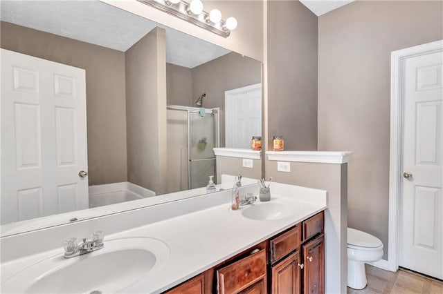 full bathroom featuring tile patterned flooring, vanity, toilet, and shower with separate bathtub