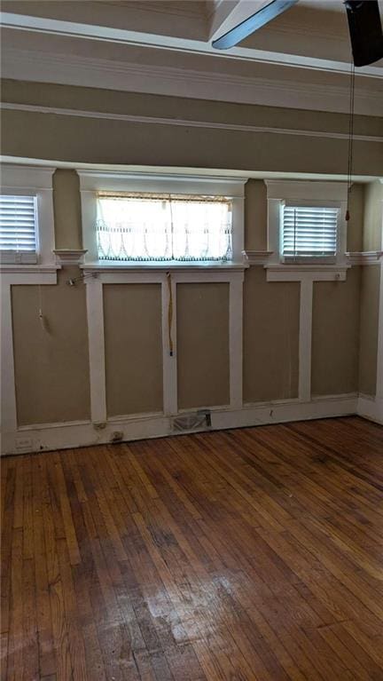 empty room featuring wood-type flooring