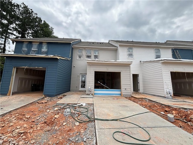 4428 Ryan St, Douglasville, GA 30135 - rear view of house featuring a garage