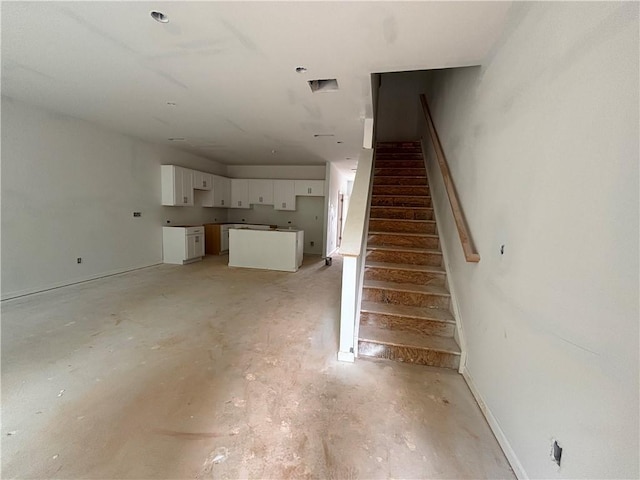 4428 Ryan St, Douglasville, GA 30135 - staircase with concrete flooring