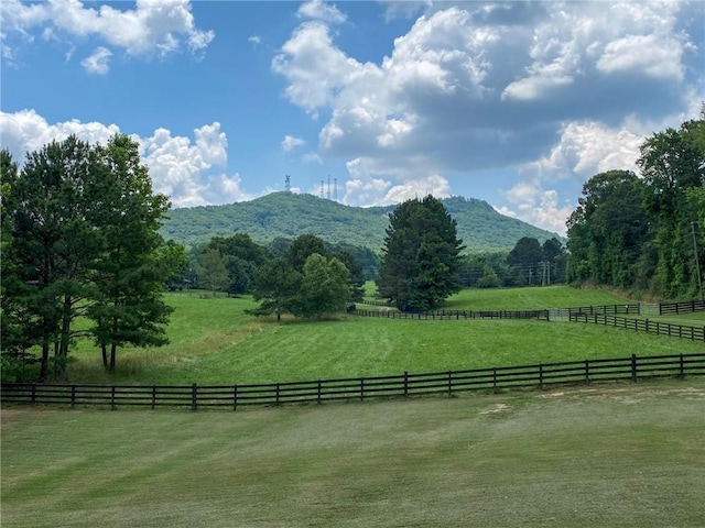 mountain view featuring a rural view