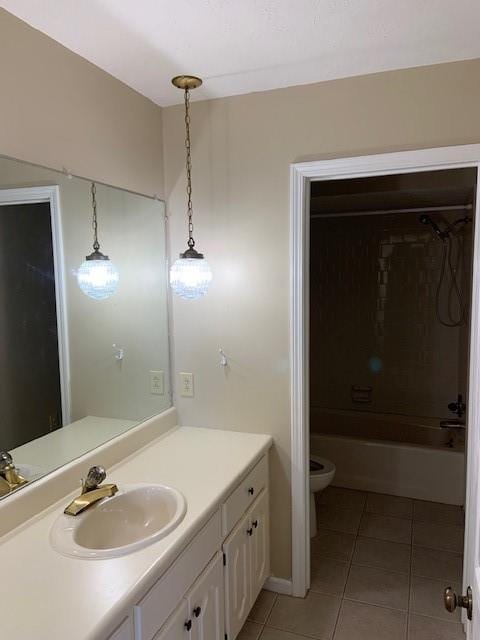 full bathroom with shower / bathtub combination, tile patterned floors, vanity, and toilet