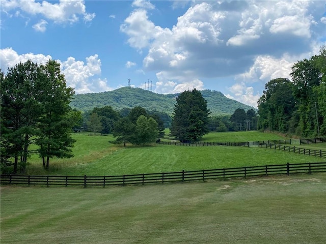 view of mountain feature with a rural view