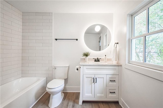 bathroom featuring vanity, toilet, and wood-type flooring