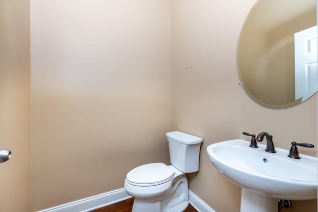 bathroom with sink and toilet