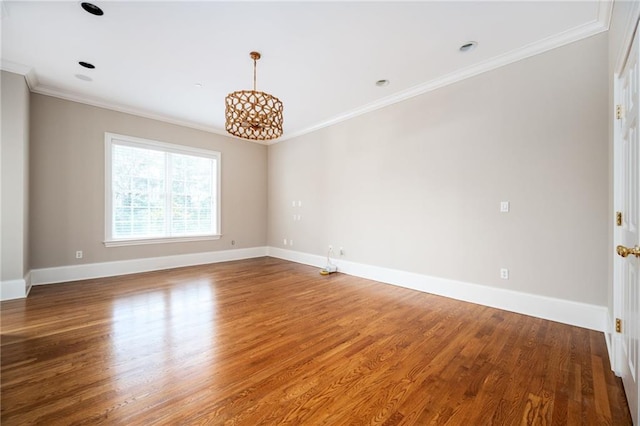 3657 Peachtree Rd NE Unit 4A, Atlanta, GA 30319 - spare room with wood finished floors and crown molding