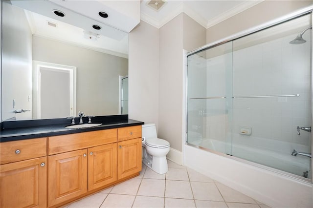 3657 Peachtree Rd NE Unit 4A, Atlanta, GA 30319 - bathroom with ornamental molding, tile patterned flooring, vanity, and combined bath / shower with glass door