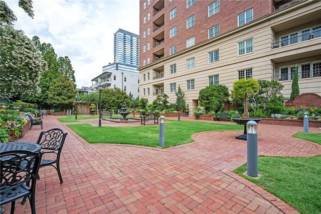 3657 Peachtree Rd NE Unit 4A, Atlanta, GA 30319 - view of community with a yard and a patio area
